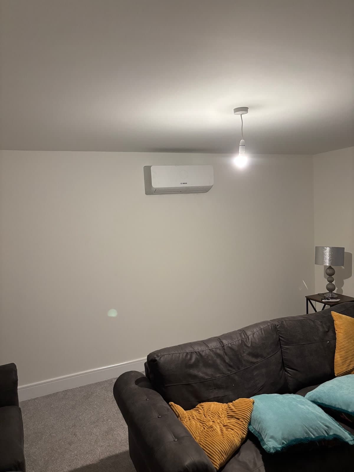 Wall-mounted air conditioning in a lounge