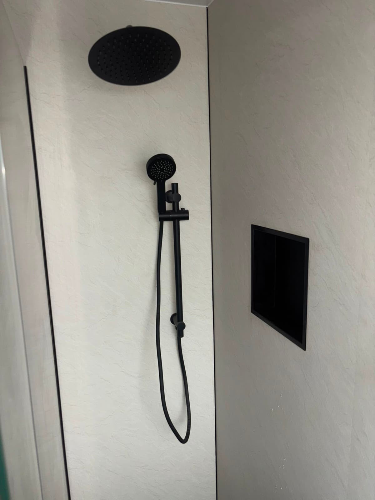Black round rainfall shower head