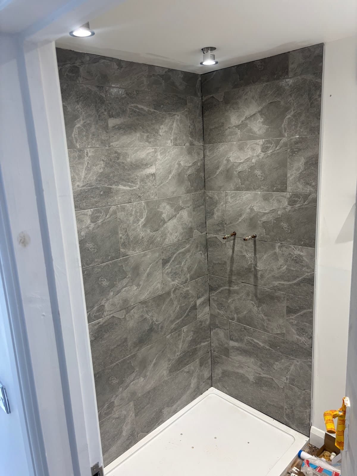 Slate-tiled shower enclosure