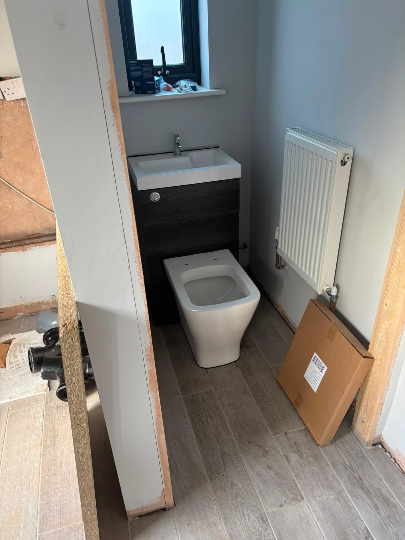 Bathroom with oak-effect flooring